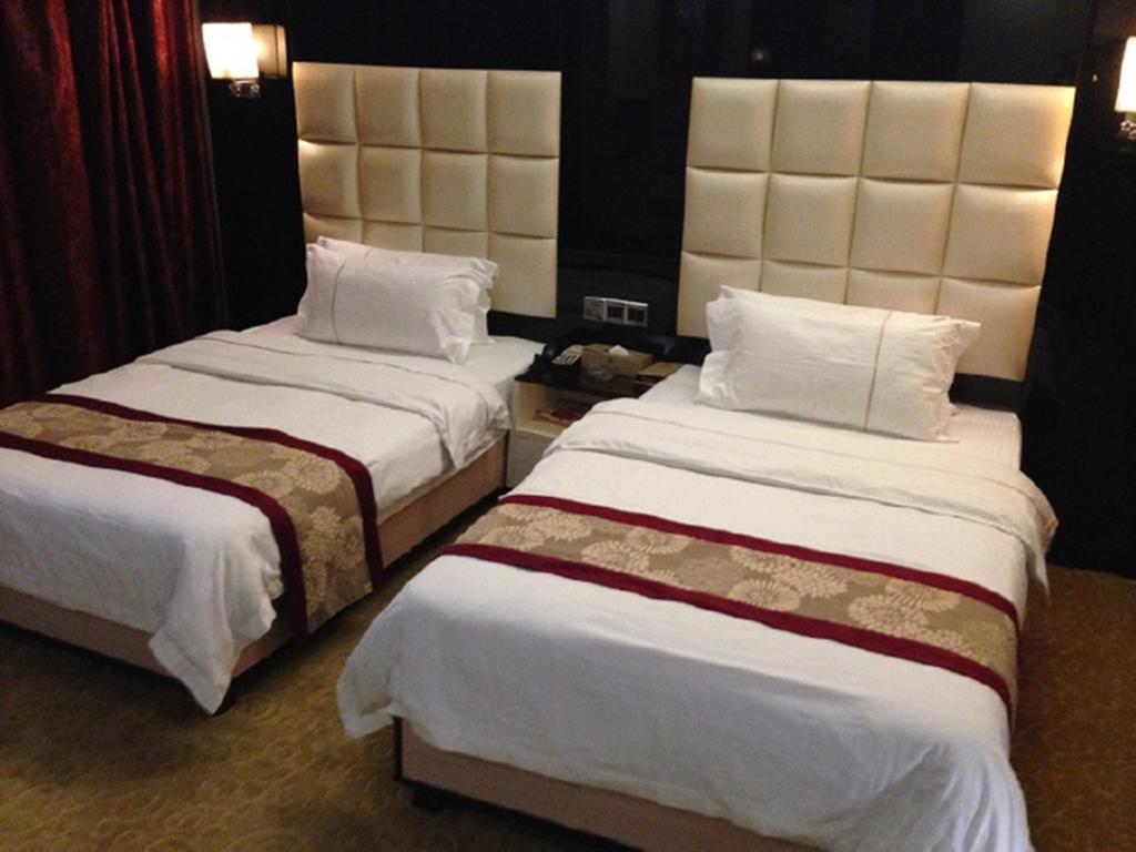 Tianguo Times Hotel Foshan Room photo