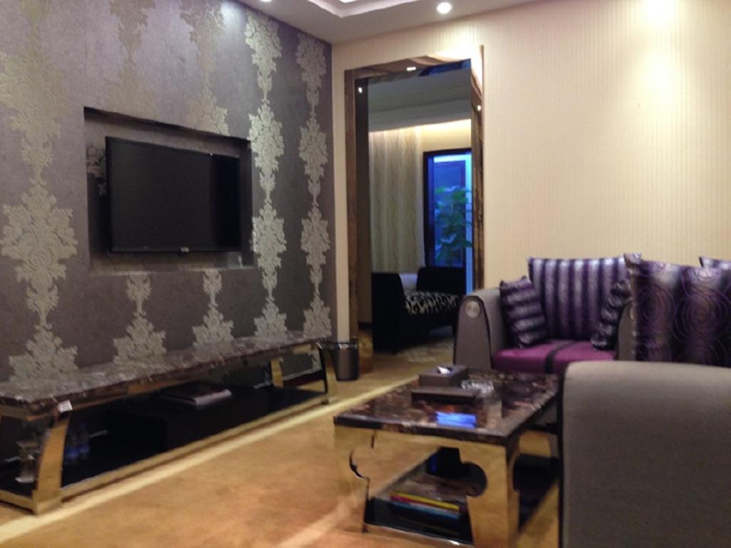 Tianguo Times Hotel Foshan Room photo