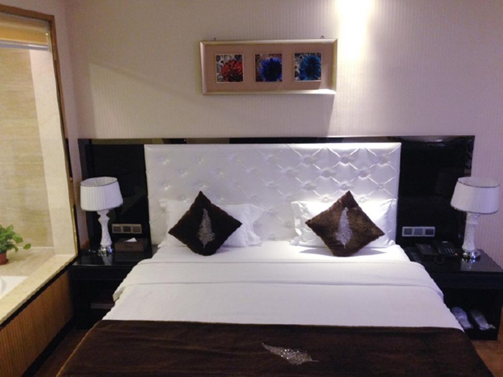 Tianguo Times Hotel Foshan Room photo